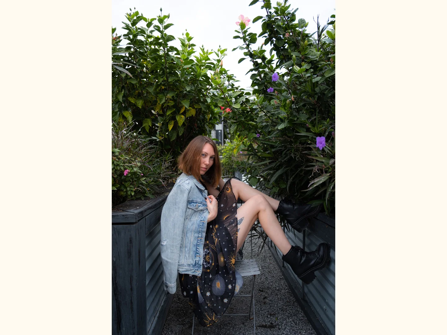 A patterned dress paired with a denim jacket.