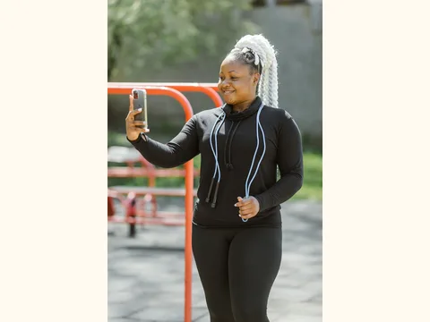 Black leggings and a long-sleeved top worn outdoors.